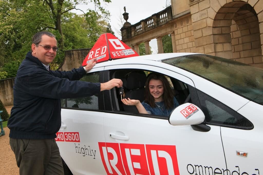 RED driving instructor Dave Childs with learner Maisie Williams