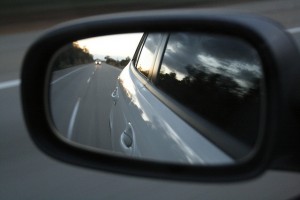 road reflection on car side mirror