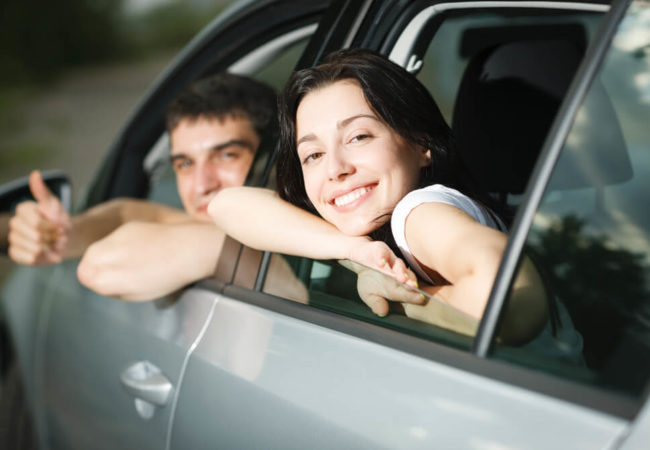 Male and female in a car