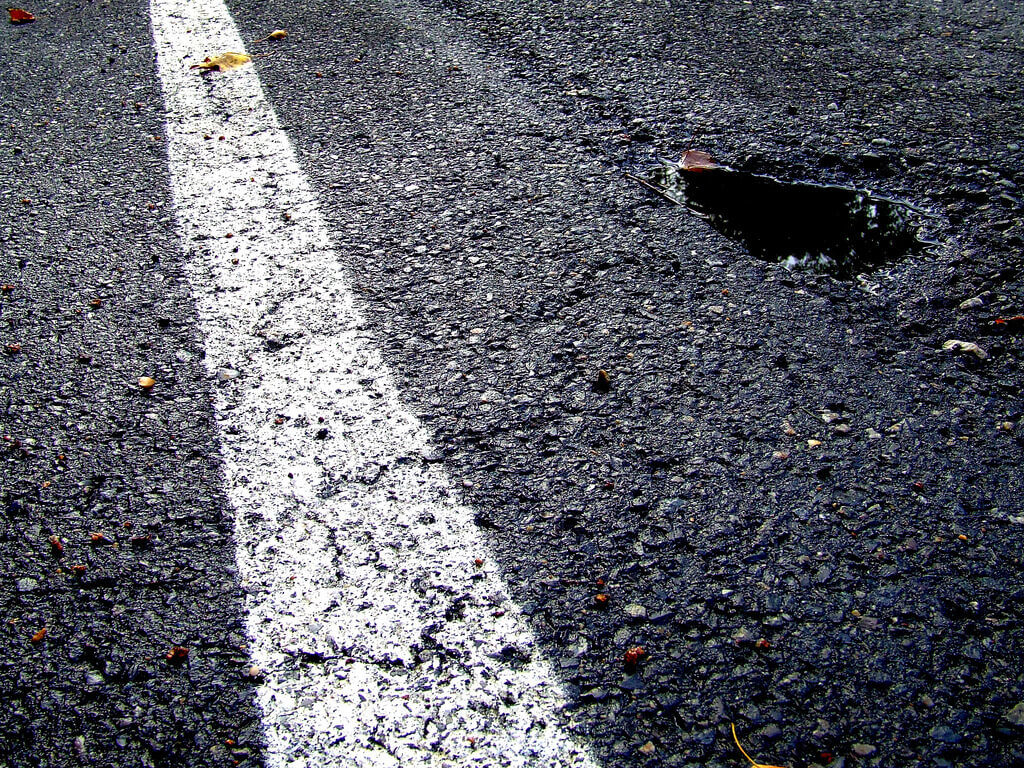 Road with pothole